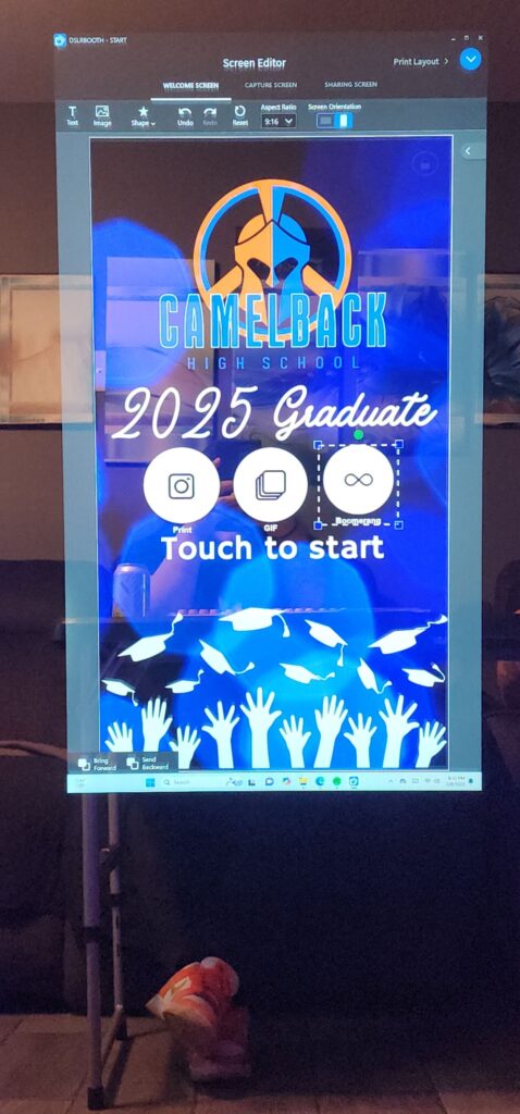 Graduation photobooth welcome screen with touch-to-start options for photos, GIFs, and boomerangs.